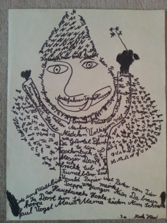 Lebensfrohes Wortmännchen in Buchstaben-Kleidung